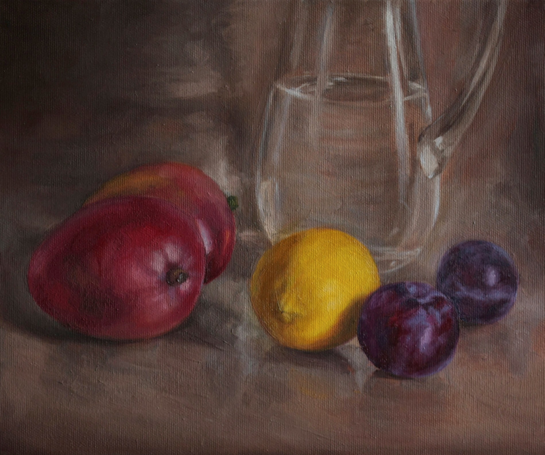 still life with mangos and glass